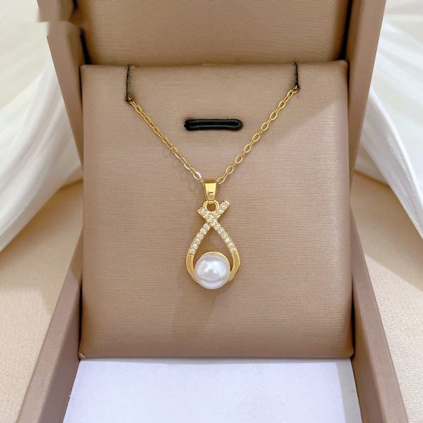 722e766f-e4a7-4df1-95b4-7b4bb7b17828.jpg Womens Light-Luxury Cross-Design Diamond-Encrusted Pearl Necklace Set