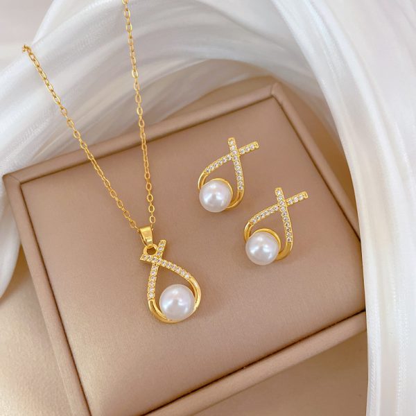 cfc2b4a3-540b-4bb4-9e7b-a387d1764356.jpg Womens Light-Luxury Cross-Design Diamond-Encrusted Pearl Necklace Set